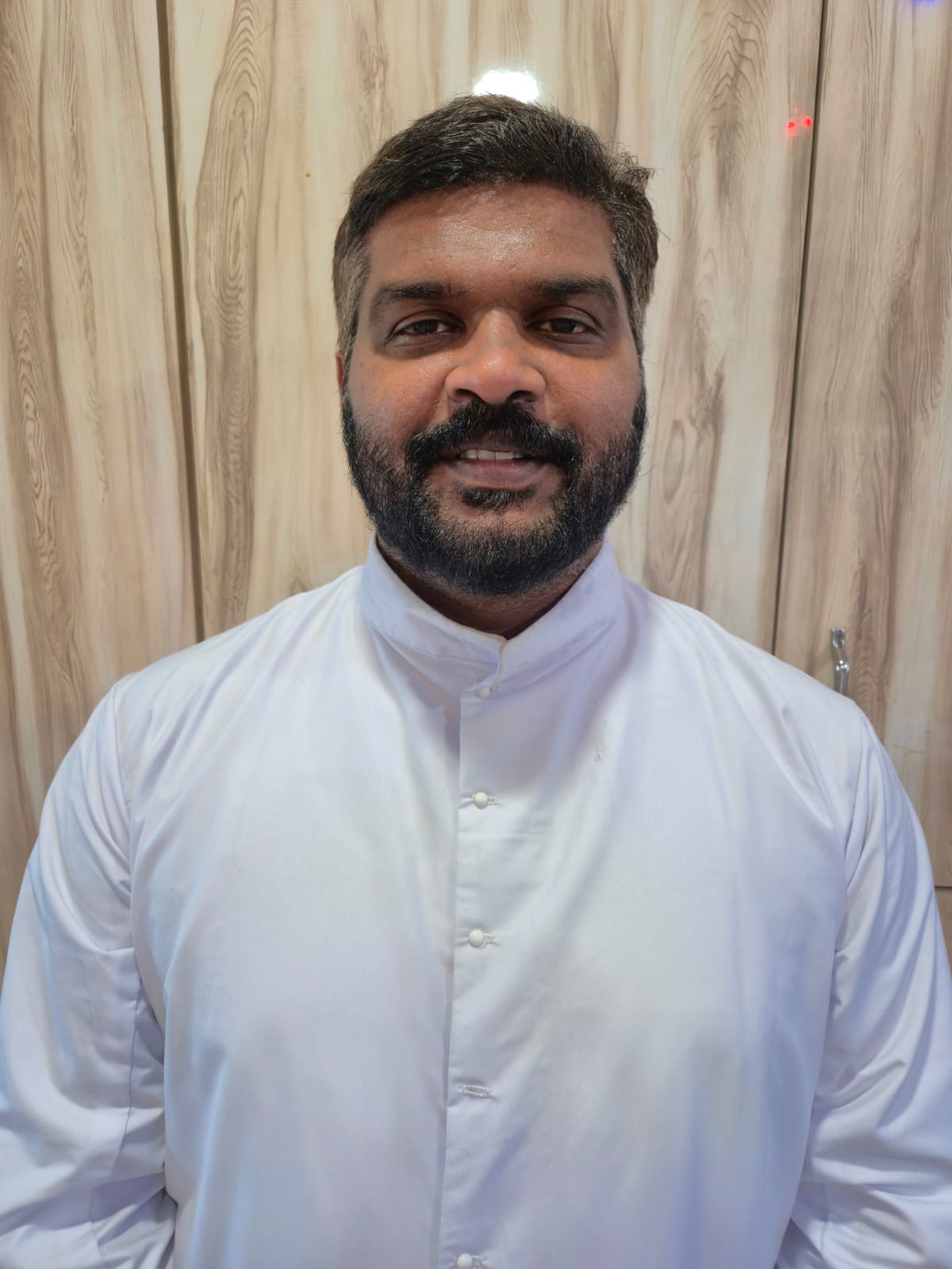 Fr. Tomcy Thomas Thattaparambil CST
