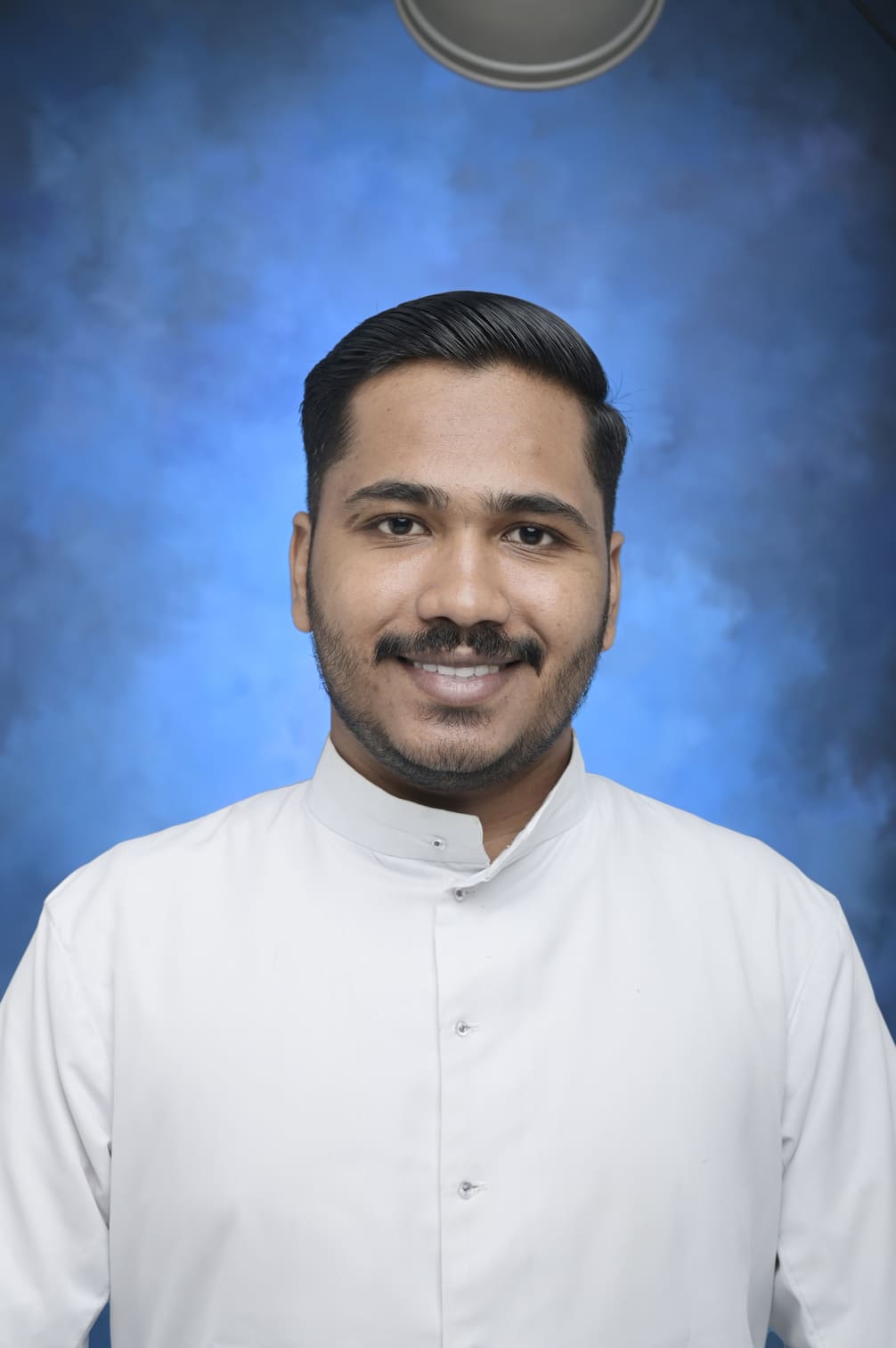 Fr. Jogin Thomas Valanakuzhiyil CST